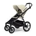 Poussette Thule Urban Glide 4-wheel Soft beige + Barre de sécurité + Protection pluie